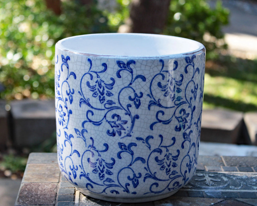 Blue and white ceramic cylindrical garden planter with vine pattern L424
